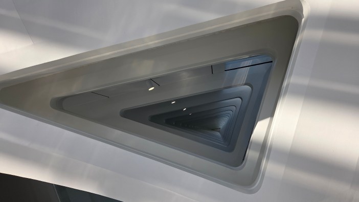 A view down a series of white triangles which are a part of a museum in Milwaukee.